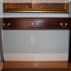 F53. The Bombay Company mahogany console table with three drawers. 30”h x 48”w x 12”d - $185